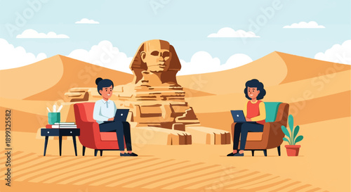 Two people working on laptops in chairs in a desert with the Sphinx behind them