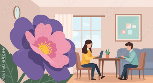 Two people working on laptops in a room with a large flower