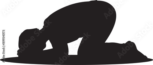 Man praying on mat kneeling bowing