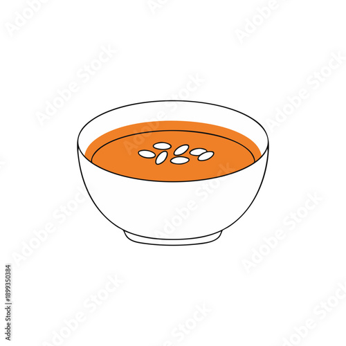 Simple bowl of orange soup with floating seed garnish