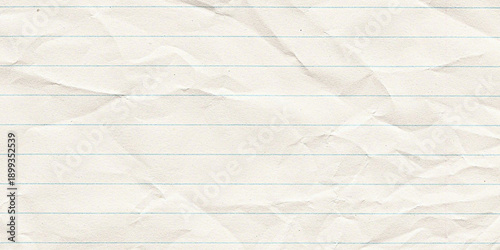Photos Close-up shot of a crumpled lined paper texture, showcasing creases and wrinkles