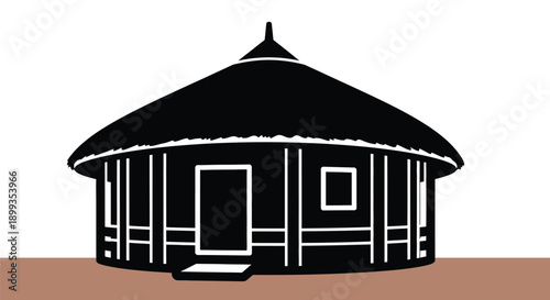 Traditional yurt house with thatched roof and wooden structure