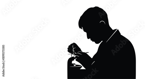 Focused craftsman meticulously working on a delicate detail with precision tools.