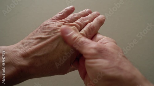 POV Close-up elderly male hands. The concept of age-related problems and diseases of the bones and joints of the palms 4K