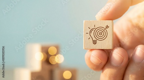 Business Goal Achievement and Innovation Strategy Concept with Target Icon on Wooden Block