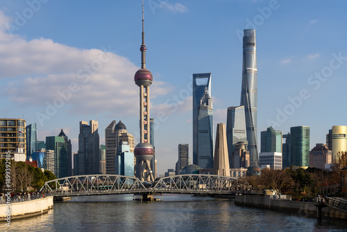 Shanghai, China: Shanghai city skyline along the Suzhou creek river with Waibaidu Bridge and the modern skyscrapers of Pudong financial district in China.