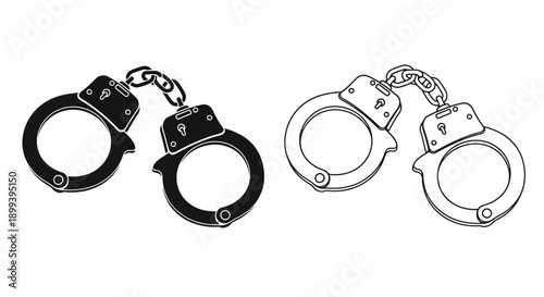 A pair of black and white handcuffs symbolizing restraint and law enforcement