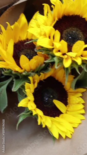 Bright Sunflowers in Brown Paper Wrapping: A Celebration of Summer Beauty and Floral Charm (Short Vertical)