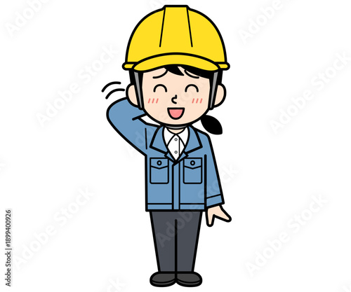 照れているヘルメットをかぶった現場監督の女性