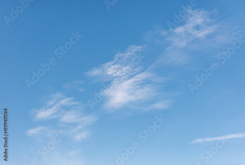 Tableau sur toile A clear blue sky with a few clouds