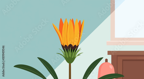 Vibrant orange and yellow flower in a room with soft light