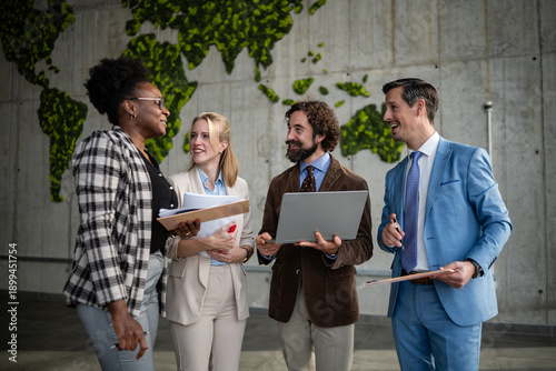 Diverse business team discussing global strategy in office