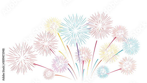 Vibrant display of multiple colorful fireworks bursting in the white sky celebrating a holiday or special festive event.