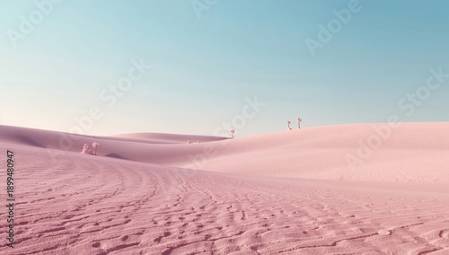 Sand Dunes Stretch Across the Landscape Under a Blue Sky With Light Clouds