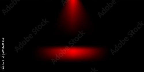 Red spotlight on black background with stage floor light effect