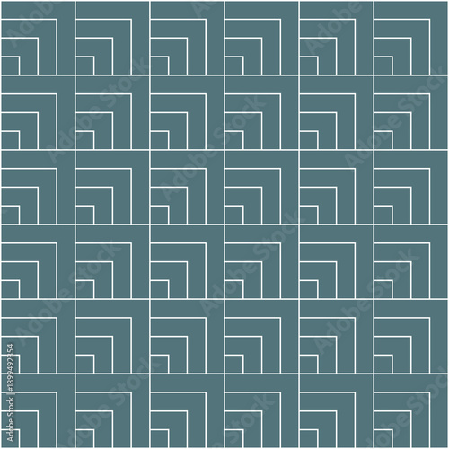 Pattern created from blocks of different sized overlapping teal blue squares sperated by white borders