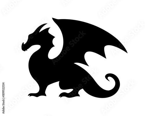A black silhouette of a regal dragon standing with wings spread open