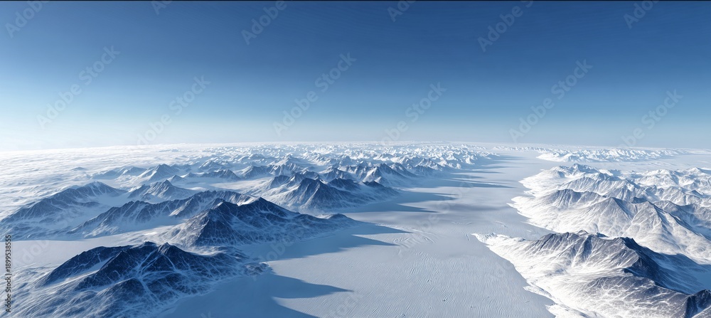 Fototapeta premium Majestic Icescape An aerial panorama captures the serene beauty of a vast, icy landscape, where snow-covered mountains meet a pristine, frozen expanse under a clear, endless sky. 