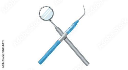 Dental instruments crossed over each other on a plain white surface viewed from directly above