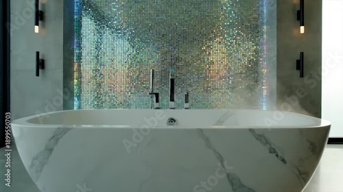 Modern Luxury Bathroom with Freestanding Bathtub and Waterfall Feature.