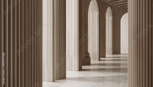 Columns Stand in a Long Hallway With Arches in a Modern Building During Daylight