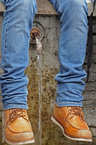 Legs and running water