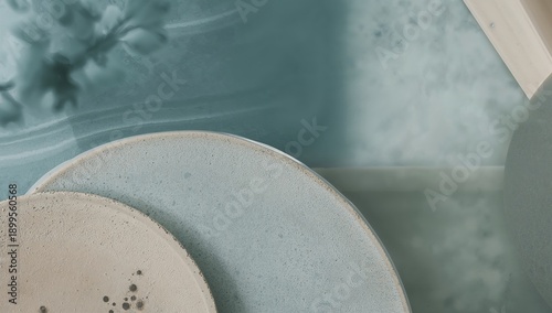 Plates and a Smooth Surface Create a Simple Setting in the Kitchen With a Coo...