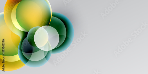Abstract circles overlap, creating vibrant yellow, green hues. Background transitions from black to gray. Modern design element.