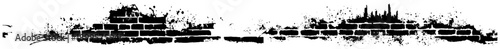 Horizontal grunge brick wall border with artistic black ink splatters