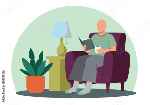Person reading a book and drinking coffee while relaxing in an armchair