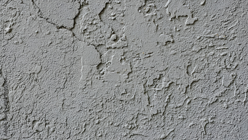 Obraz premium Weathered gray concrete surface with cracks and texture