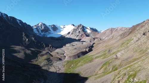 mountain gorge. mountain plateau. snow-capped rock peaks