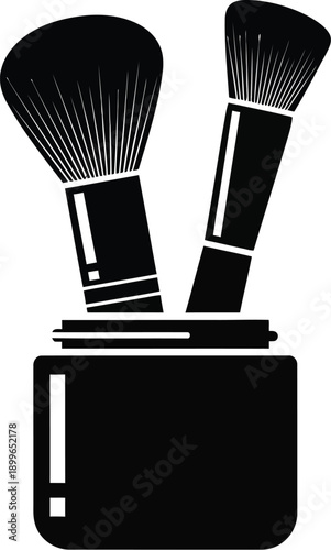 Makeup brushes in a holder.