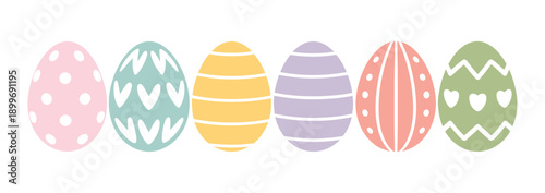 A colorful arrangement of decorated Easter eggs on a white background