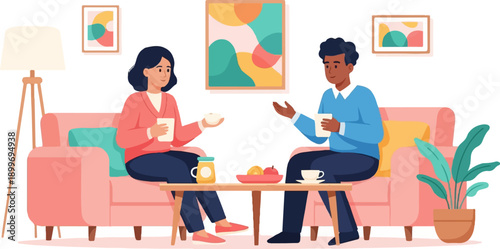 A couple shares a moment indoors, enjoying drinks and conversation