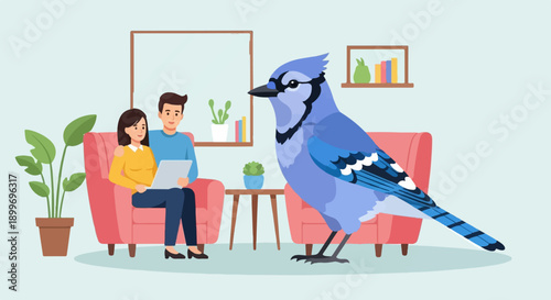 A couple sits on a couch using a tablet while a large blue jay stands nearby