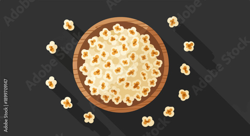 A wooden bowl overflowing with fluffy popcorn on a dark surface
