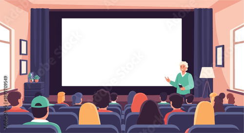 An audience watches a presentation on a large screen in a dark room