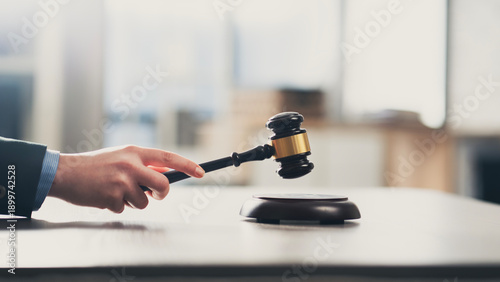 Hitting a gavel for finalizing the decision