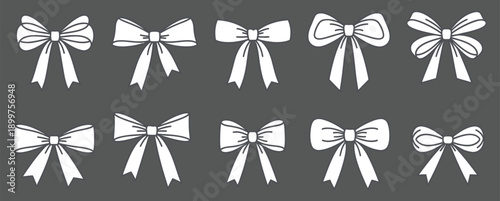 A collection of white bow illustrations on a dark gray background