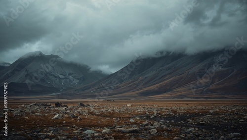 Mountains and Cloudy Sky Over a Valley With Rocky Terrain in the Wilderness o...