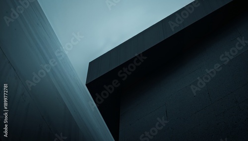 Modern Architecture With Sharp Lines Under Cloudy Sky in Urban Setting
