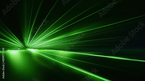 Dynamic background of fast moving green light with motion blur and stripes, for tech visual, design