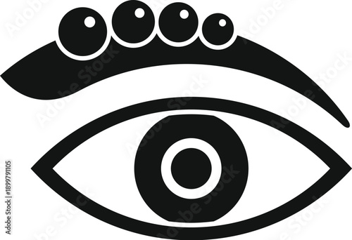 Human eye with several small balls piercing the eyebrow