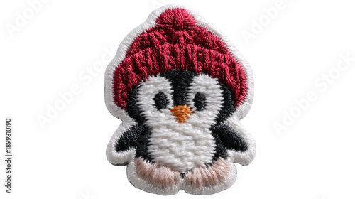 Cute embroidered penguin patch wearing a red winter hat, perfect for crafts, apparel, and accessories, showcasing adorable winter themes and playful design