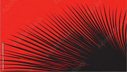 Tropical palm fronds overlapping in a dynamic red and black abstract background illustration from a close-up viewpoint