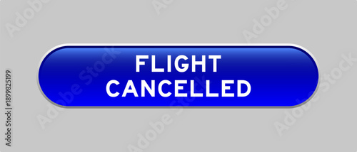 Blue color capsule shape button with word flight cancelled on gray background
