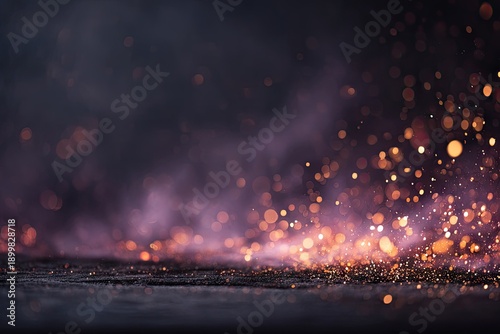 Abstract background of glowing particles and bokeh effect in dark space