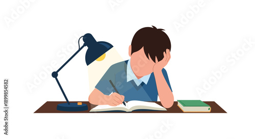 A young boy studies diligently at a desk under a bright lamp