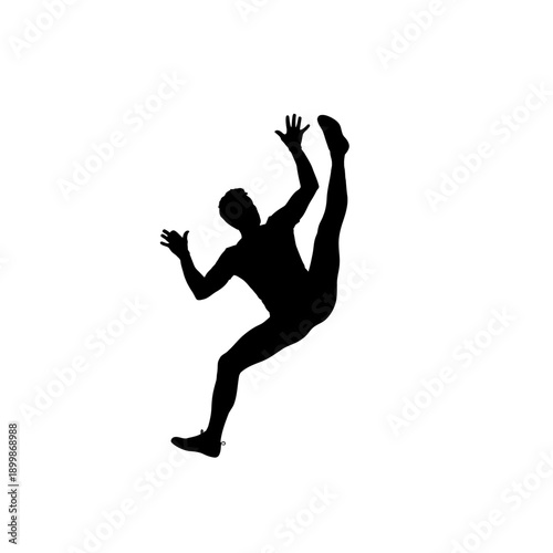 Silhouette of athletic man performing high kick exercise.